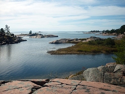 Small islands off the coast of Georgian Bay seen while hiking in Killarney Provincial Park yields splendid views of the Georgian Bay from the Chikanishing Creek Trail