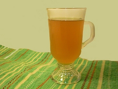 A cup of my homemade kombucha tea sitting pretty as I explain some common misconceptions about kombucha tea.