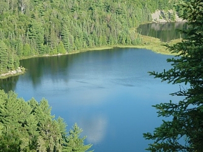 Fishing on a point of one of the Brush Lakes while backcountry tripping in Mississagi Provincial Park.