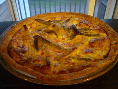 Vegetarian pie baking with green and yellow beans.
