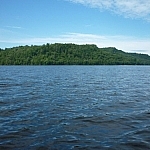 Scenic view of the hills surrounding Helenbar Lake, taken at water level from a canoe.