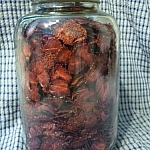 Large jar of dehydrated strawberries.