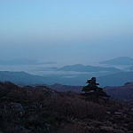 Catching sunrise from a peak while trekking Jirisan is an essential part of the experience.