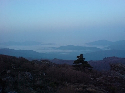Catching sunrise from a peak while trekking Jirisan is an essential part of the experience.