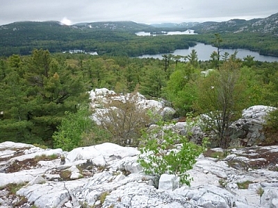 Magnificent vistas of faraway mountains while trekking Killarney's La Cloche Silhouette loop trail.