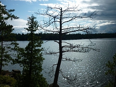 Lake Nipissing in uncertain weather photographed from the Coastal Trail while day-tripping on the shores of Lake Nipissing in Mashkinonje Park.