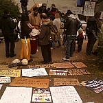 Signs and posters laid out on the ground at Occupy Toronto.
