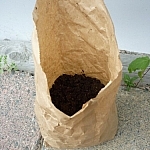 Top view of a bag of worm castings shows the contents.