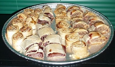 Pètes de Soeurs rolls sliced and arranged on a baking sheet.