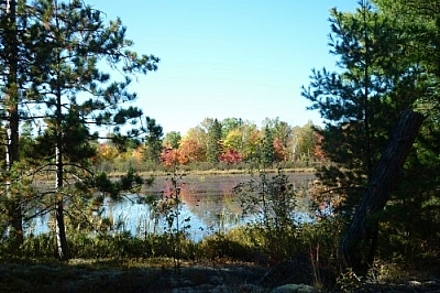 Pioneer Trail, one location where usage and safety rules should be posted, first leads to this spot on Lac Clair.