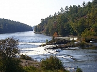 A small gushing waterfall with historical significance in French River Provincial Park