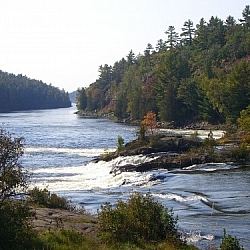 A small gushing waterfall with historical significance in French River Provincial Park