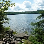 A rocky shoreline along Semiwite Lake