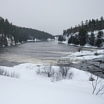 Snowshoe hiking to French River's Récollet Falls surprised us — we expected the water to be frozen!