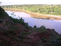 Scenic view of a Tambopata area river winding its way into the Amazon rainforest of Peru.