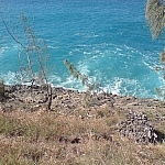 View of the ocean while looking down from a hilltop in Noosa National Park.