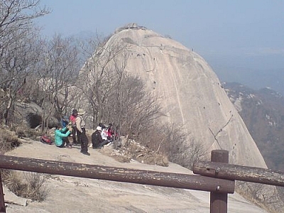 Watching free climbers on the opposite peak at Bukhansan National Park.