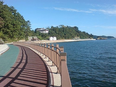 Walking along the seashore boardwalk in Tongyeong.