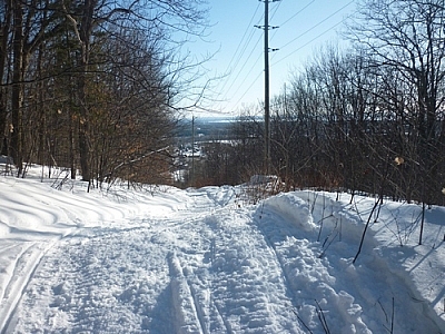 Snowmobile tracks along the Richardson Ridge Trail.