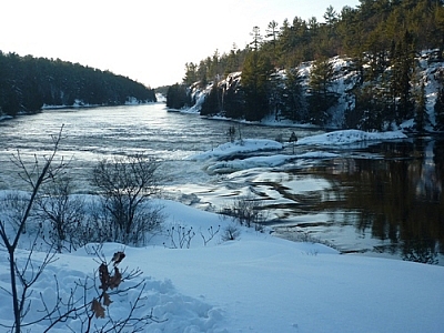 Snowshoeing along French River to Récollet Falls yields this view of the historical site.