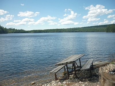 Picnic table on the shore of Christman Lake, Mississagi Park.